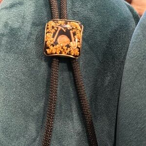 Bolo/tie with shovel and pikko, gold miners style